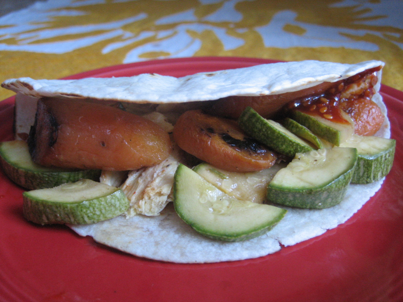 Roasted carrot tacos with zucchini, chicken, and red Korean chile sauce Roasted carrot tacos with zucchini, chicken, and red Korean chile sauce