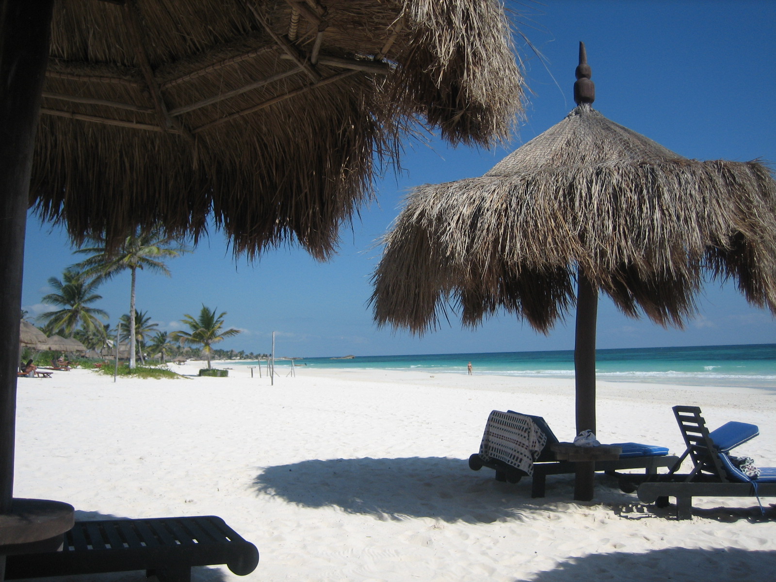 The palapas at Playa Azul, a beach hotel in Tulum, Mexico