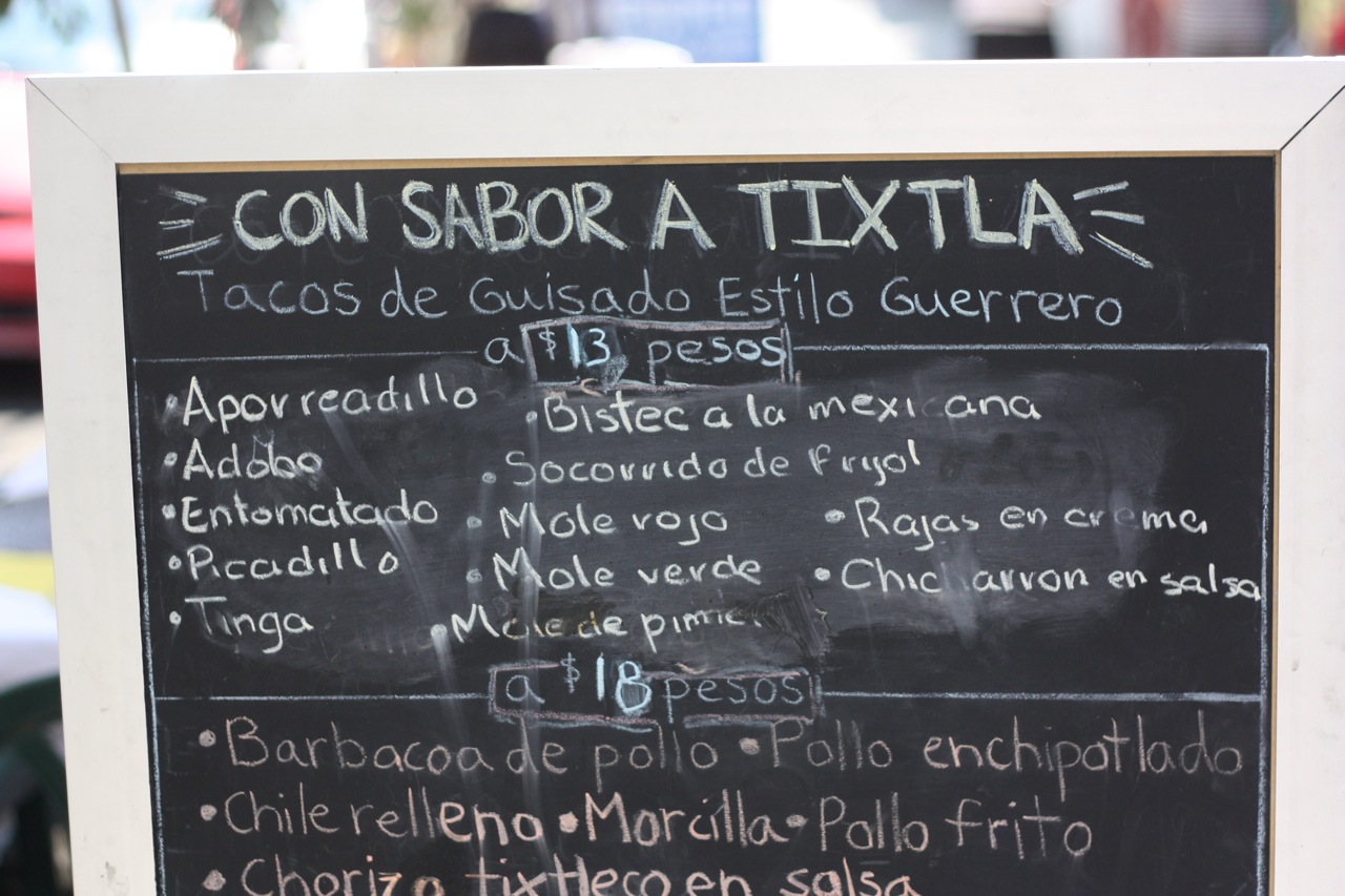 The chalkboard menu at Con Sabor a Tixtla