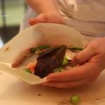 A masa-free tamal, made with mojarra, tomatillos, xoconostle and epazote