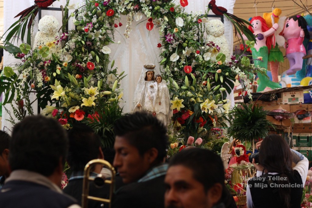 A musical group and an altar inside Mexico City's Mercado de la Merced on Sept. 24, 2012