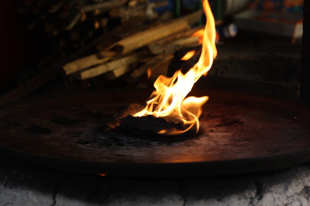 A burning tortilla for chichilo mole in Oaxaca, Mexico